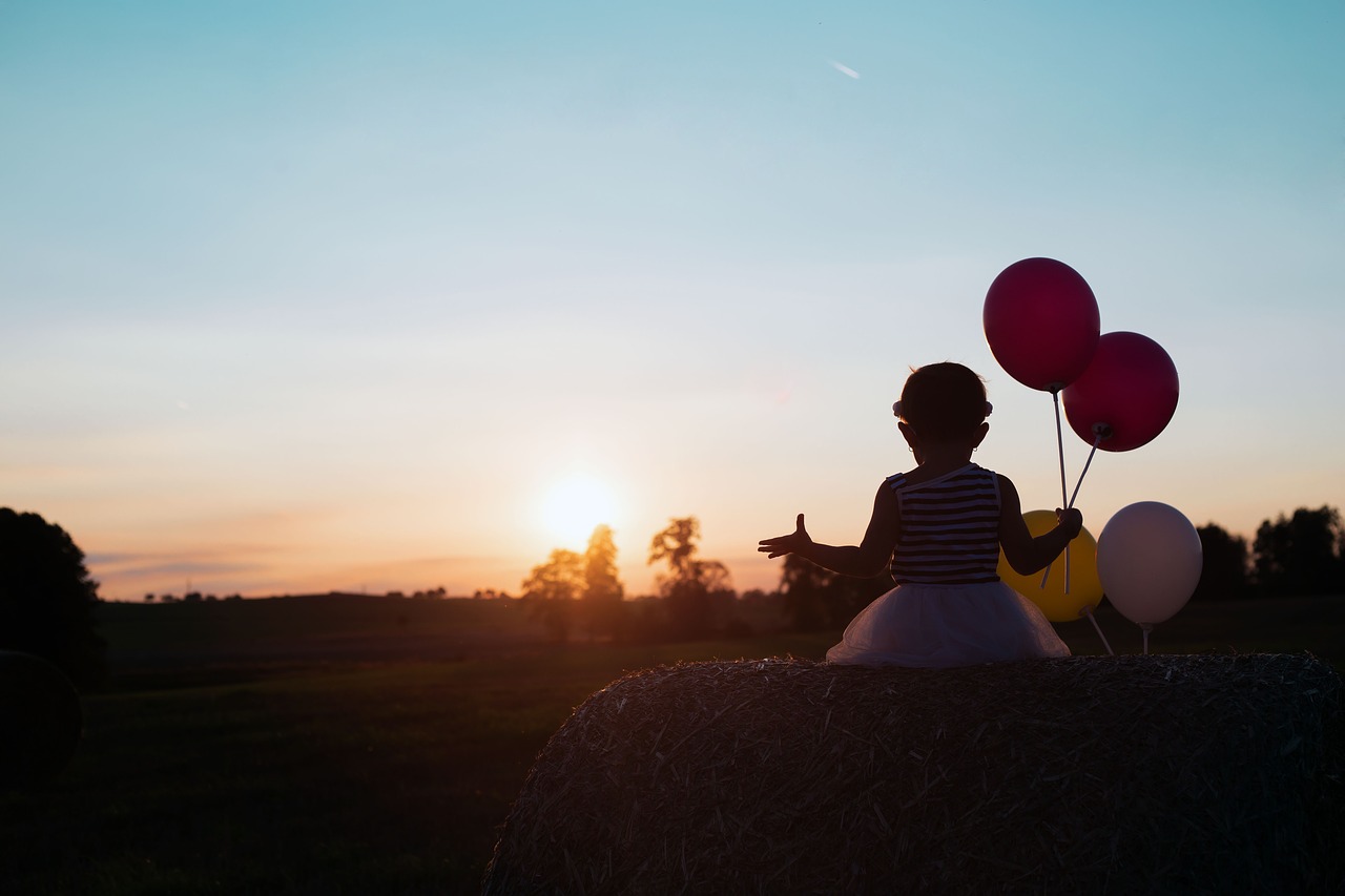 child  sunset  balloons free photo