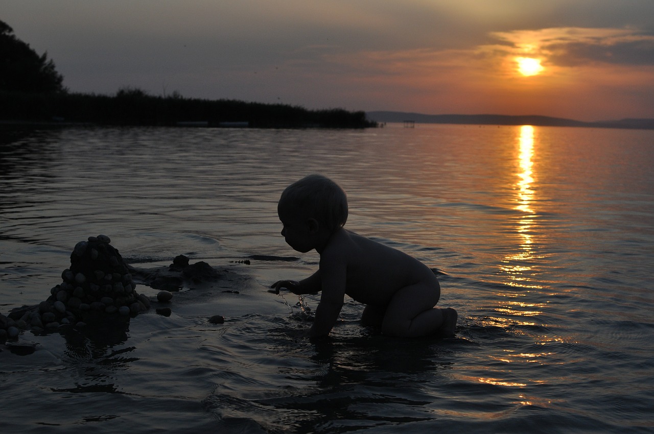 child spatter lake balaton free photo