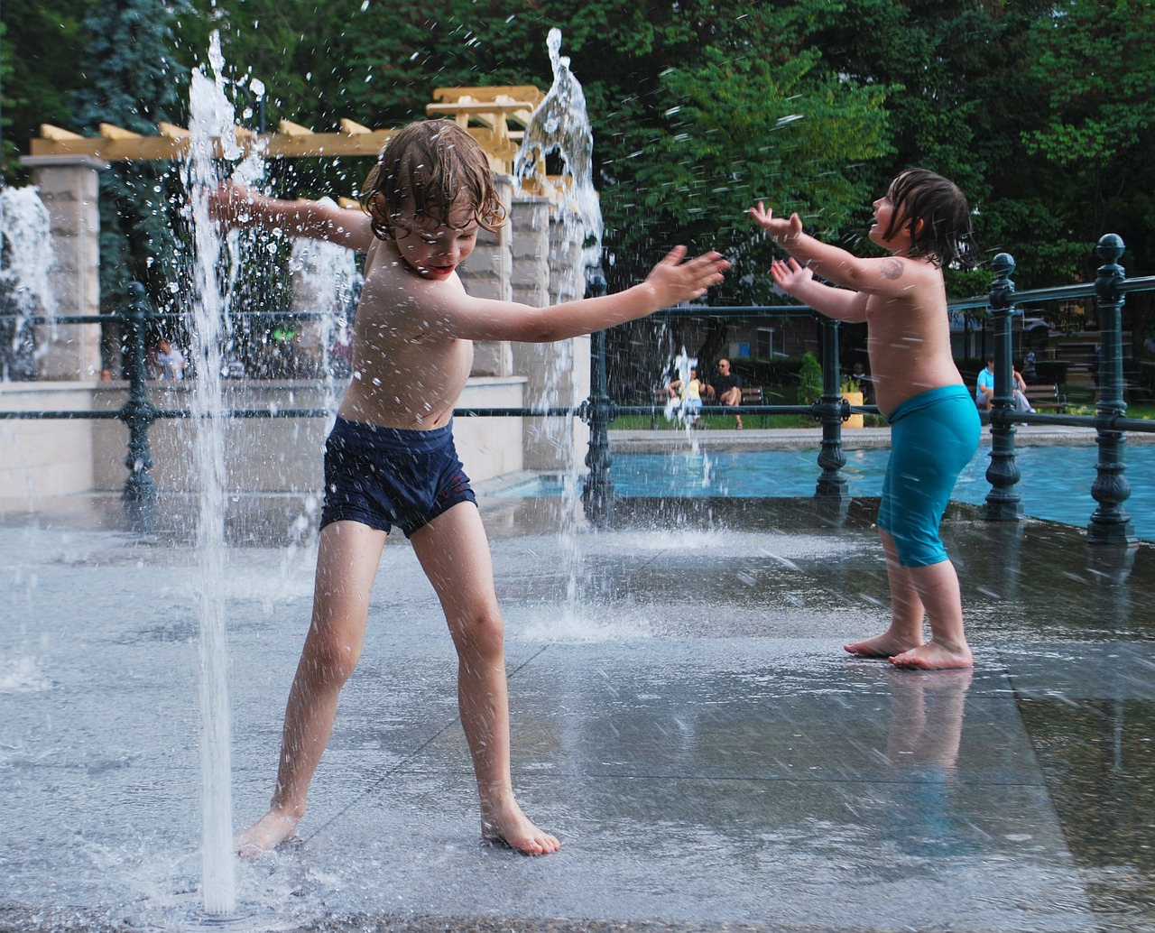 child playing water free photo