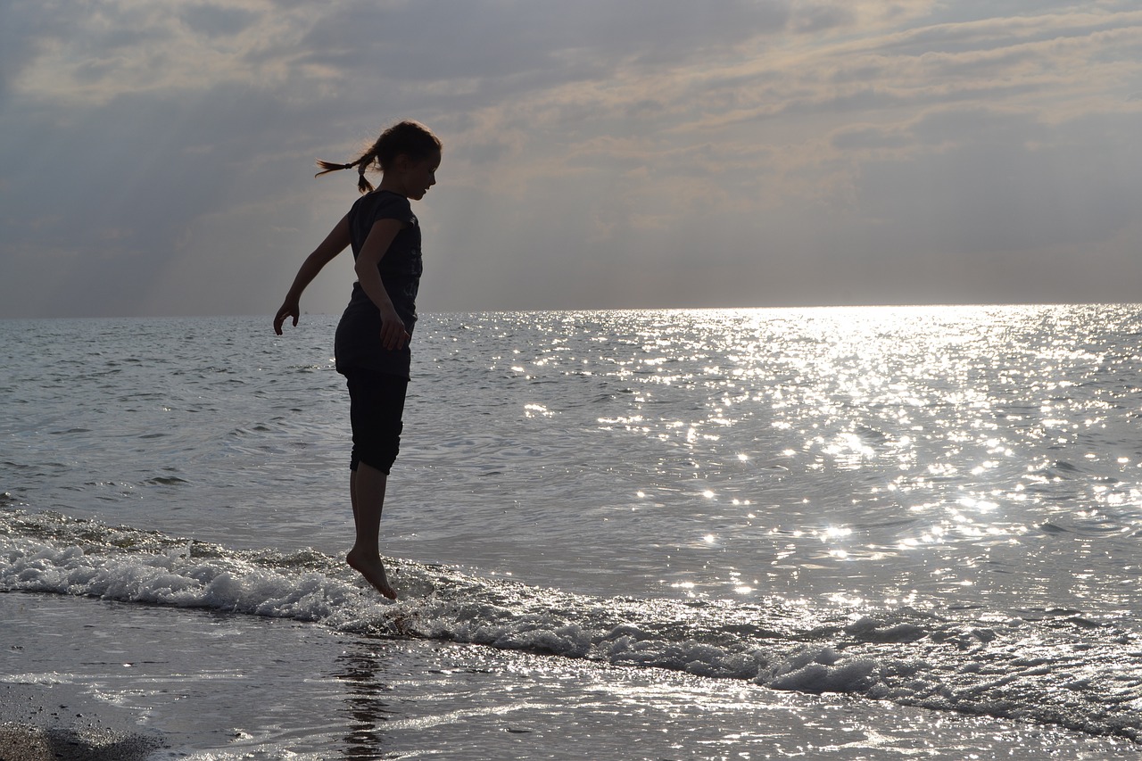 child sea jump free photo