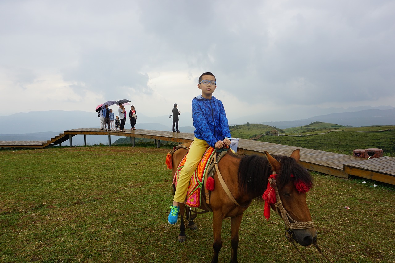 children prairie horseback riding free photo