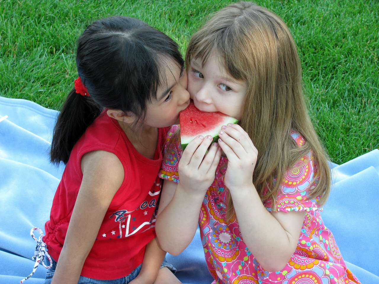 children playing watermelon free photo