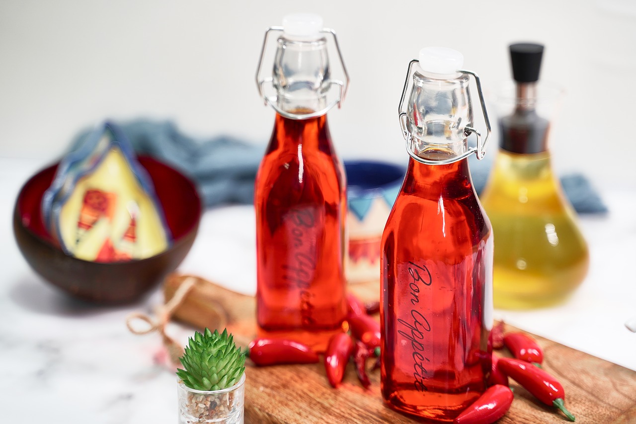 chili oil  oil  herb oil free photo