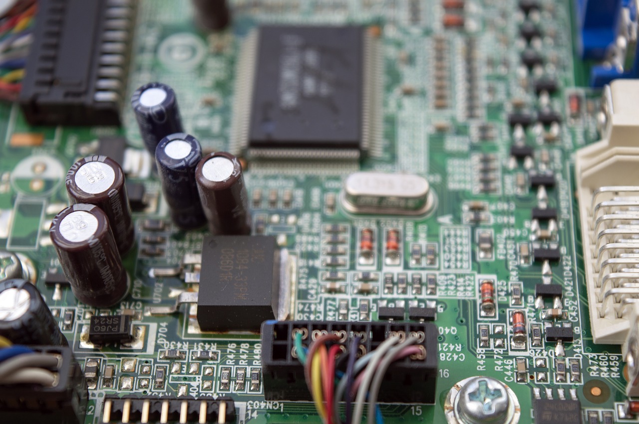 chip printed circuit board capacitors free photo