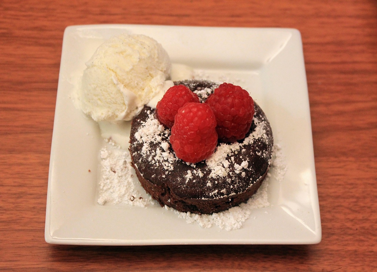 chocolate lava cake raspberries vanilla ice cream free photo