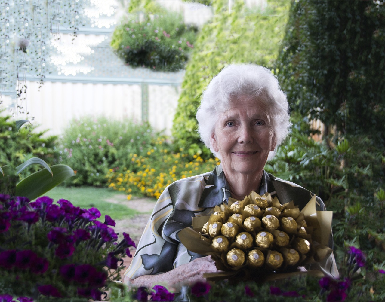 chocolates chocolate bouquet happy old woman free photo