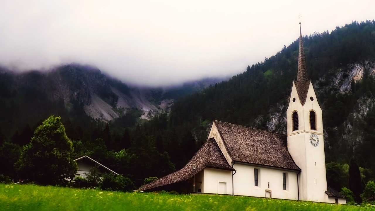 church mountains fog free photo