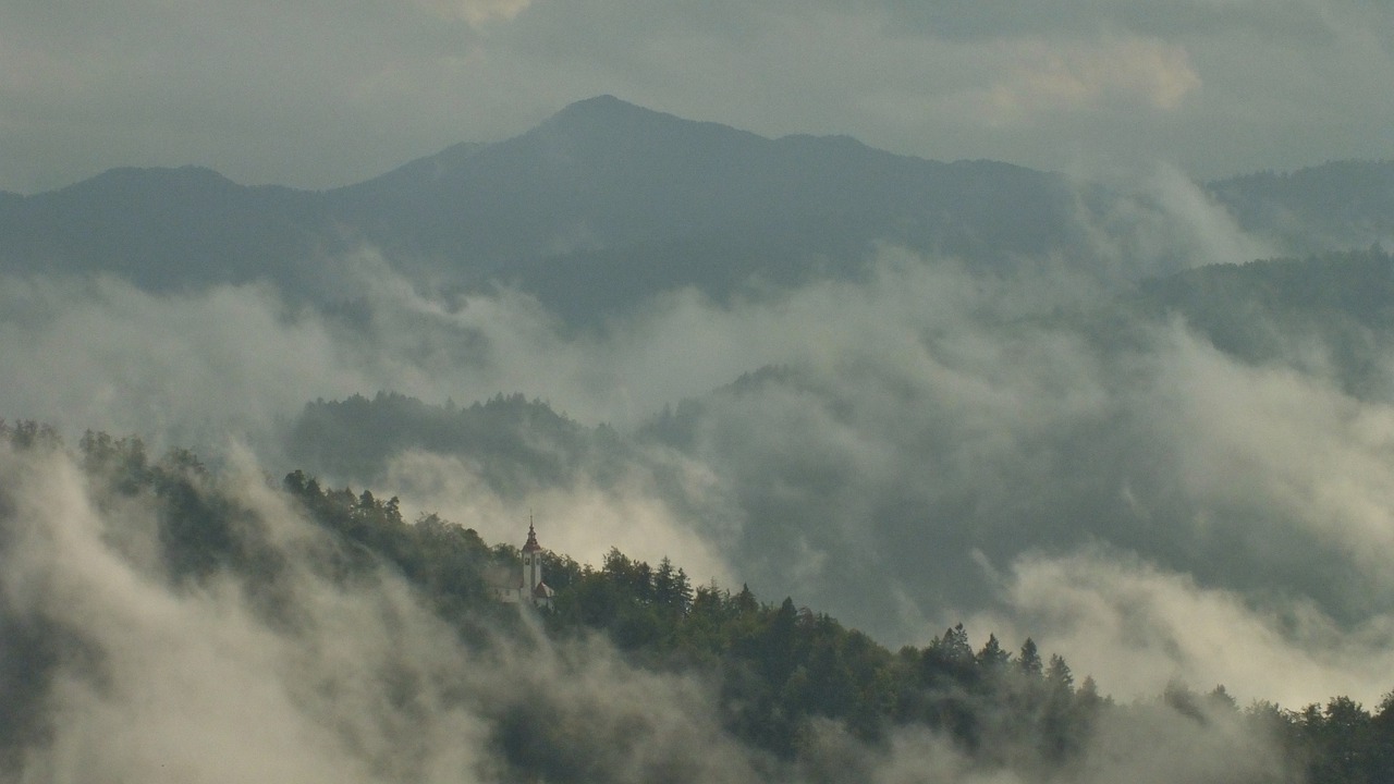 church  clouds  mountains free photo