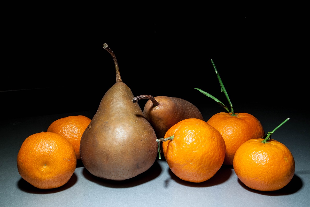 citrus fruits pears still life free photo