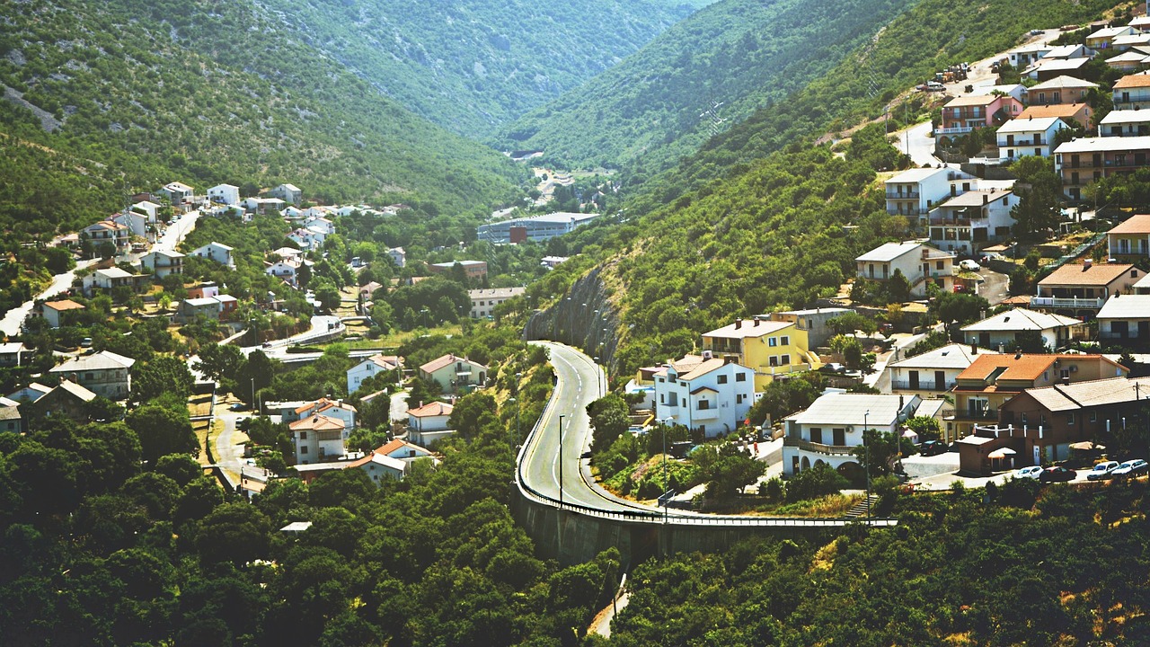 city mountains houses free photo