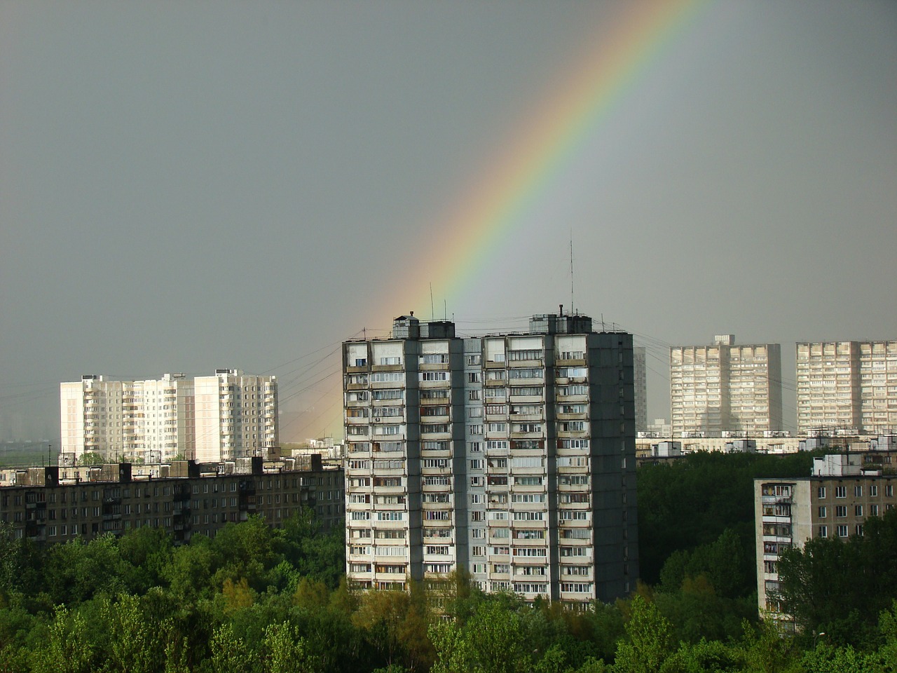 city rainbow high rise building free photo