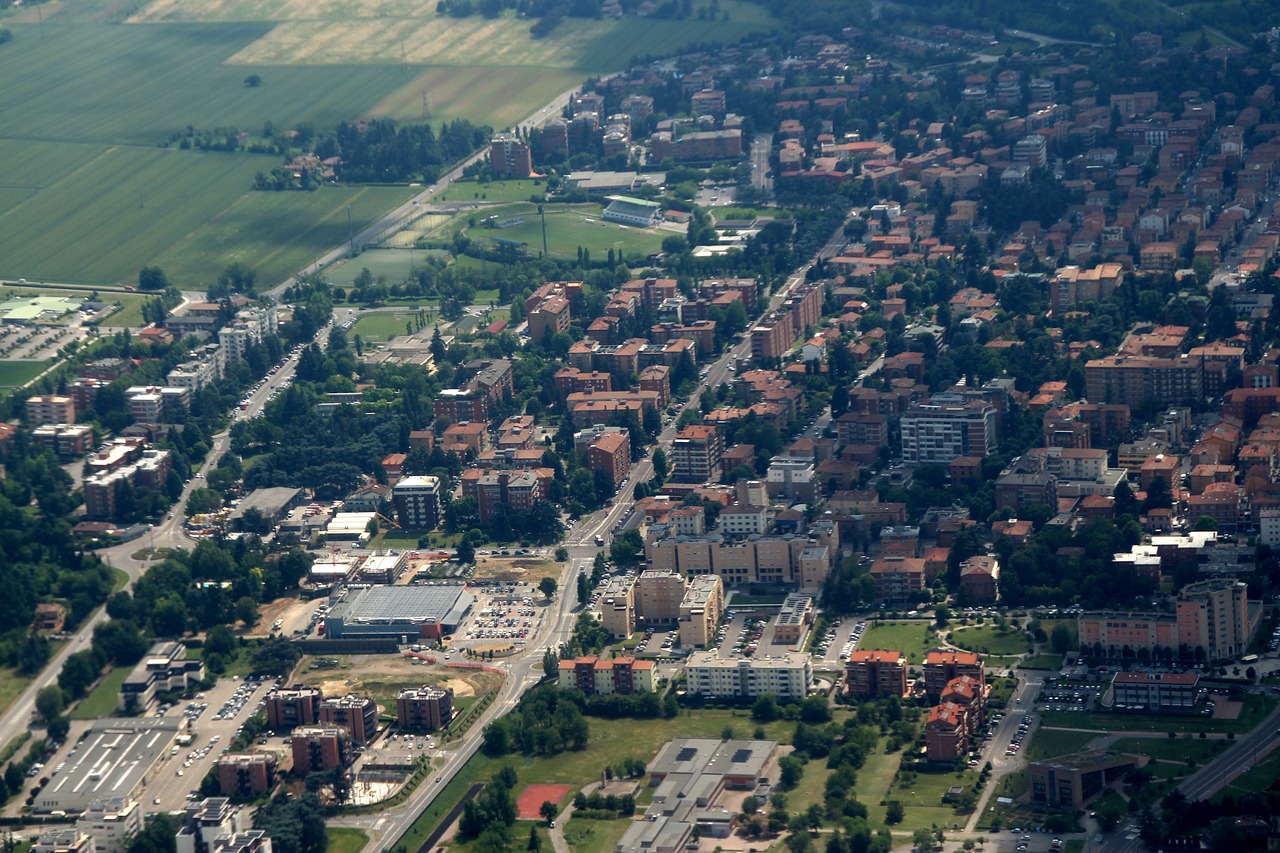 city  buildings  plane free photo