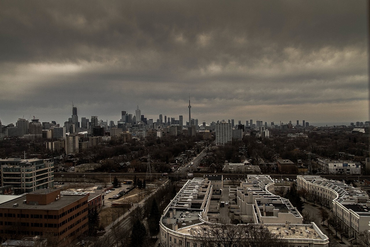 cityscape storm clouds city free photo