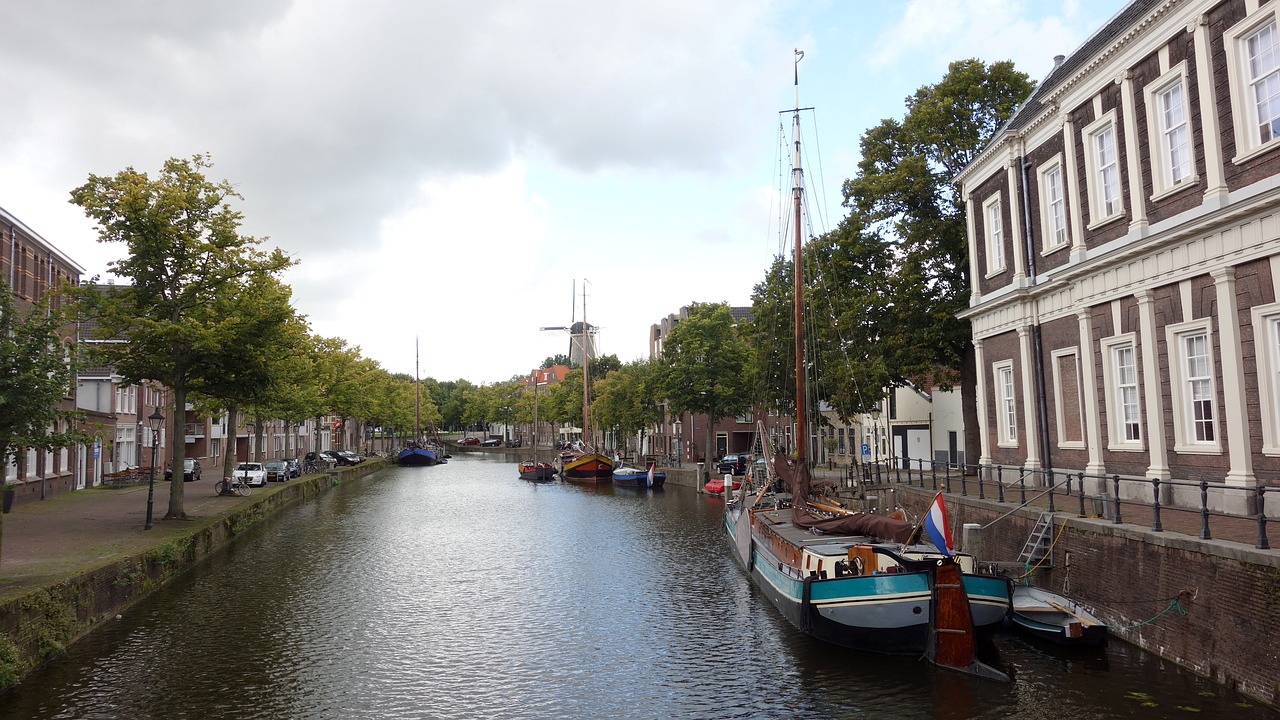 cityscape canal boats free photo
