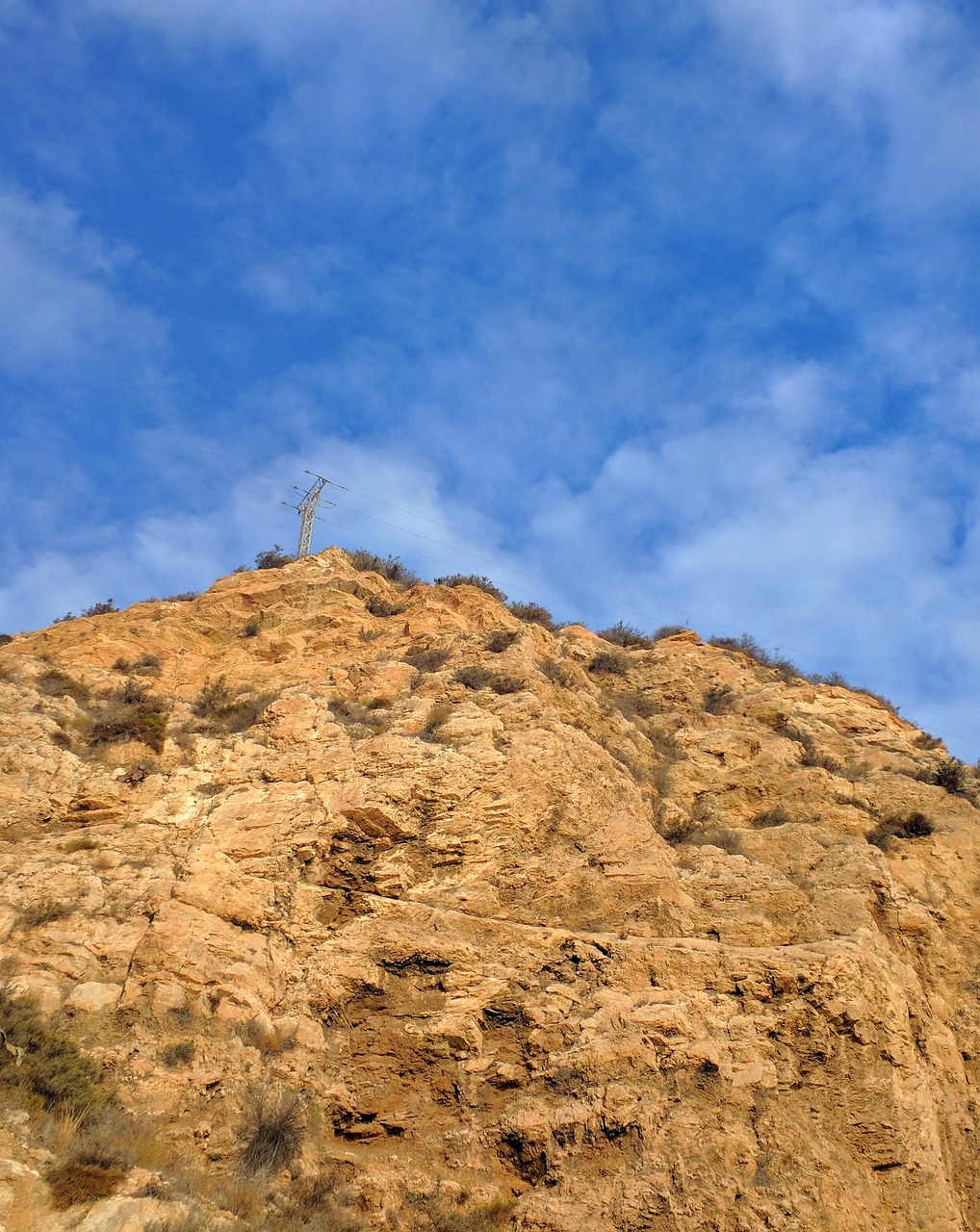 cliff sky pylon free photo