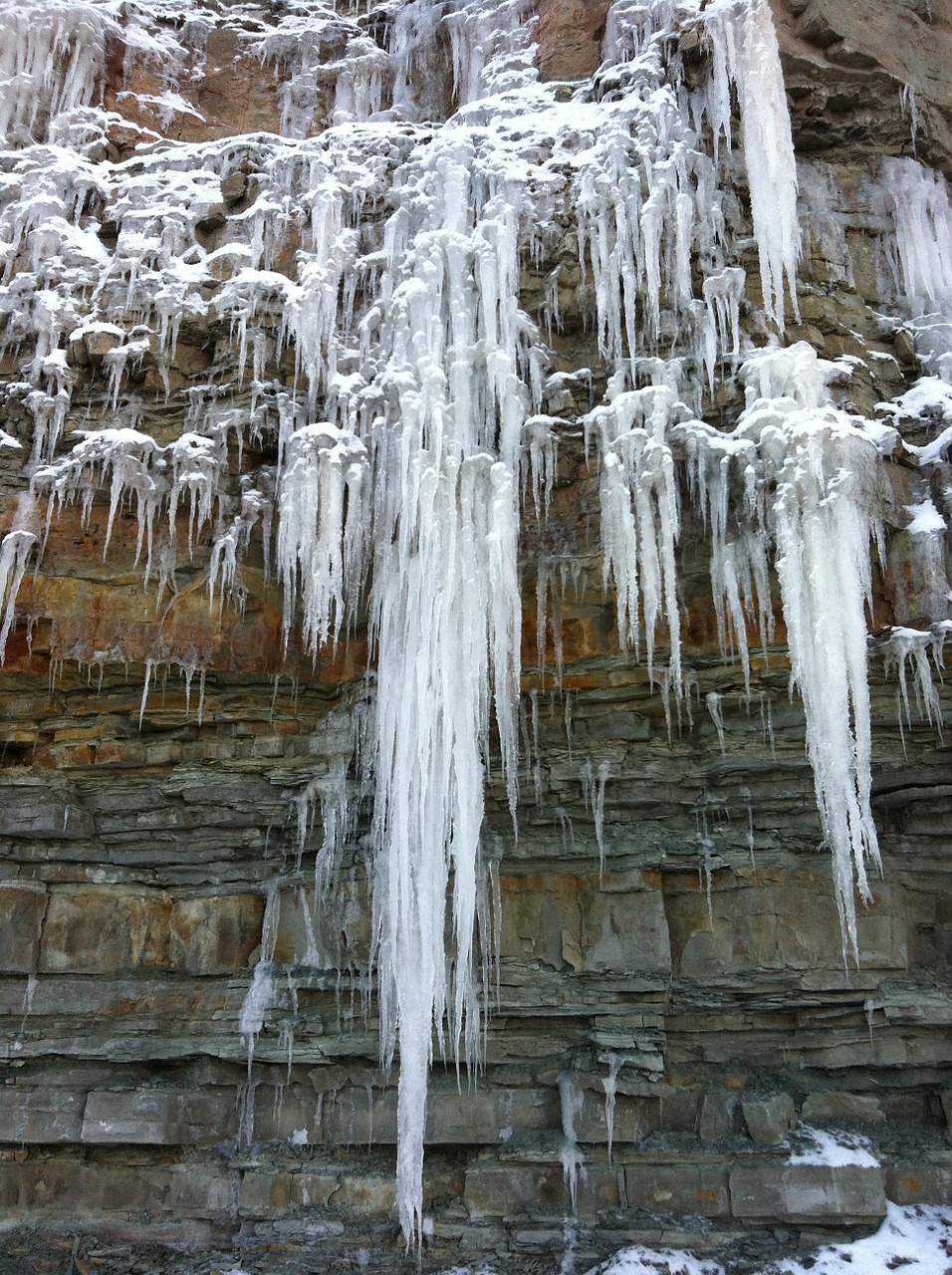 cliff icicles frozen free photo