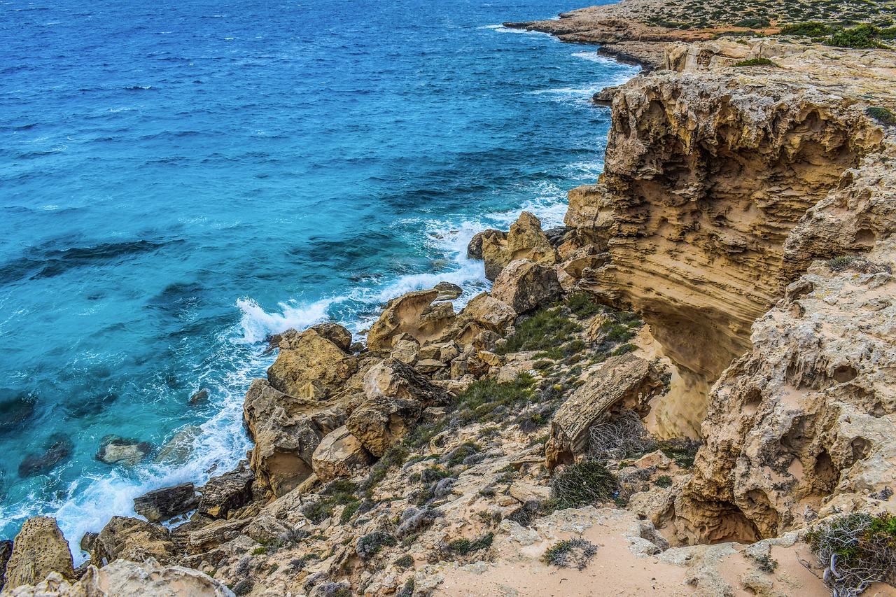 cliff sea wilderness free photo