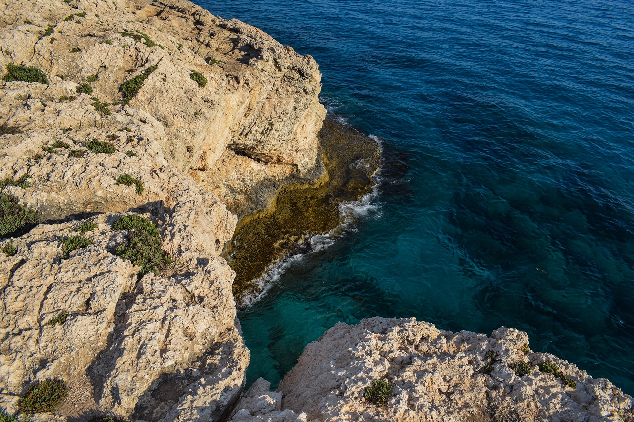 cliff rock sea free photo