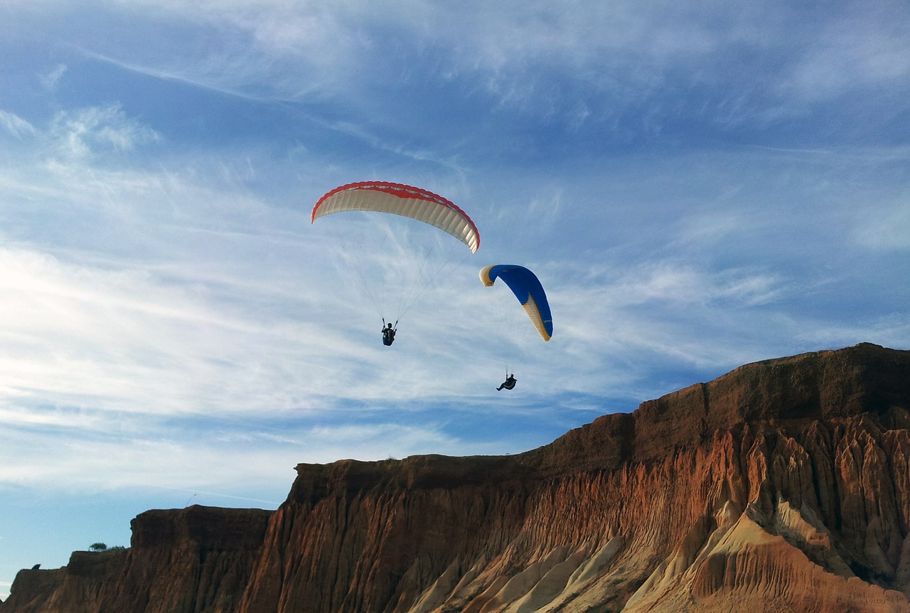 cliff sky parachute free photo