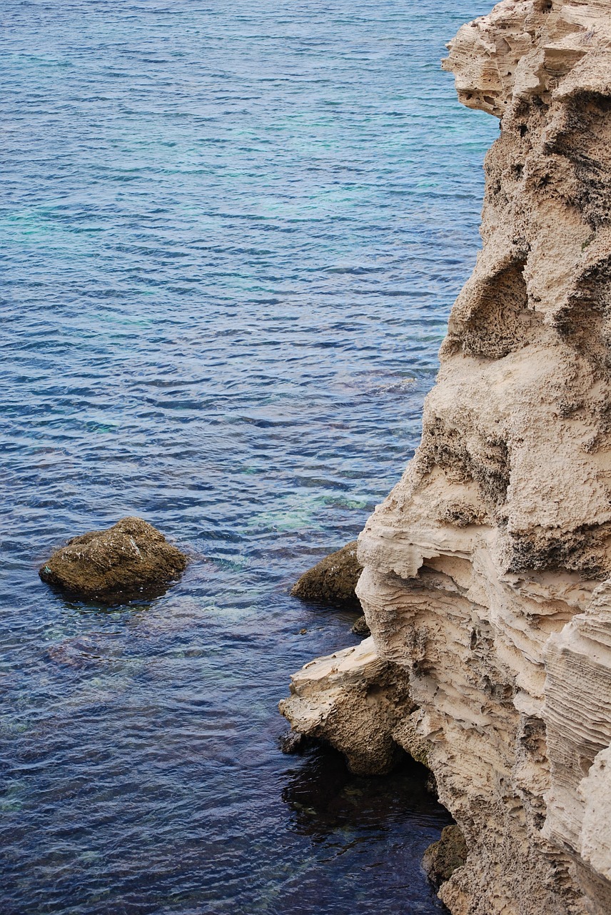 cliff sea rock free photo