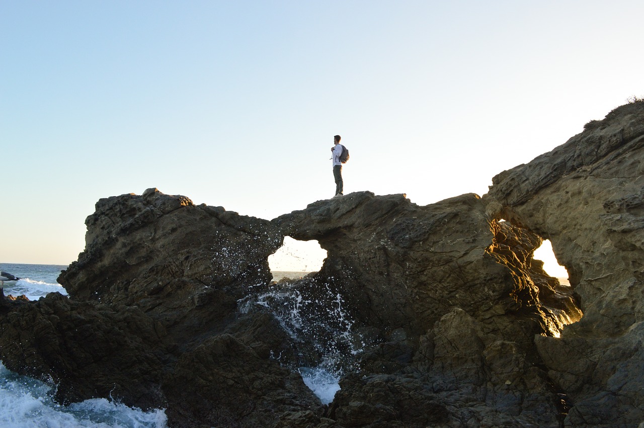 climbing rocks ocean free photo