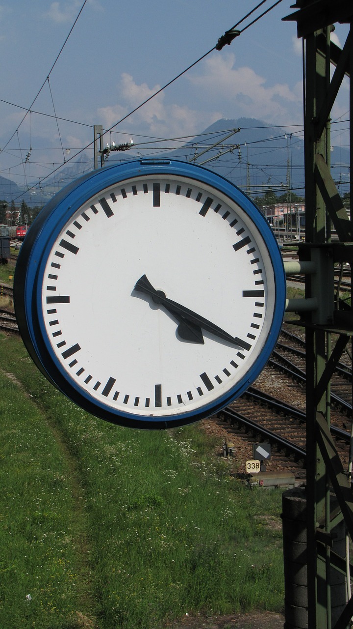 clock time indicating railway station free photo