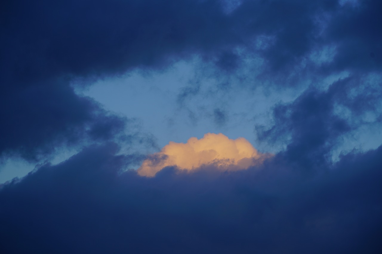 cloud illuminated blue free photo