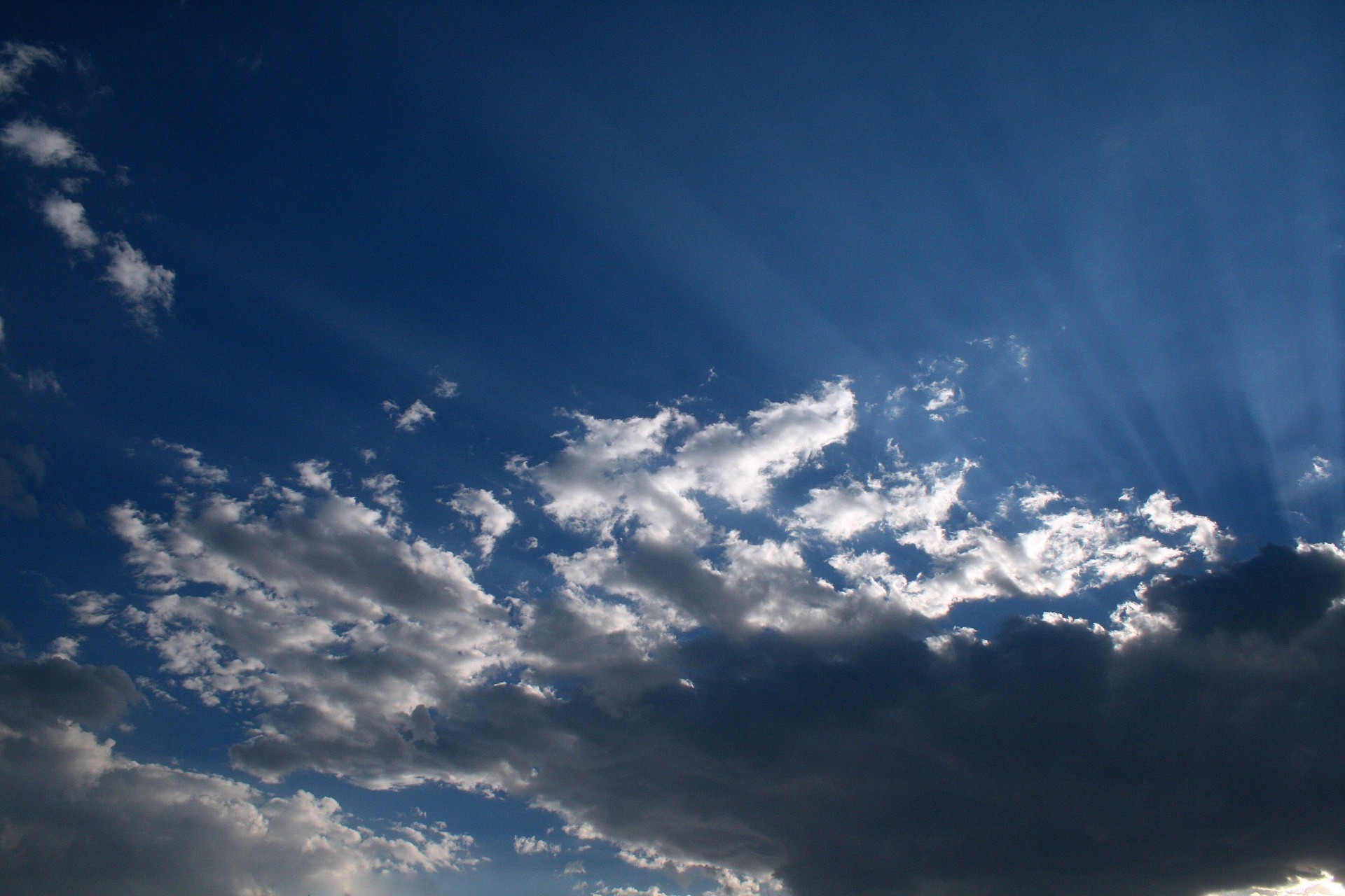 cloud shimmering sunbeams free photo