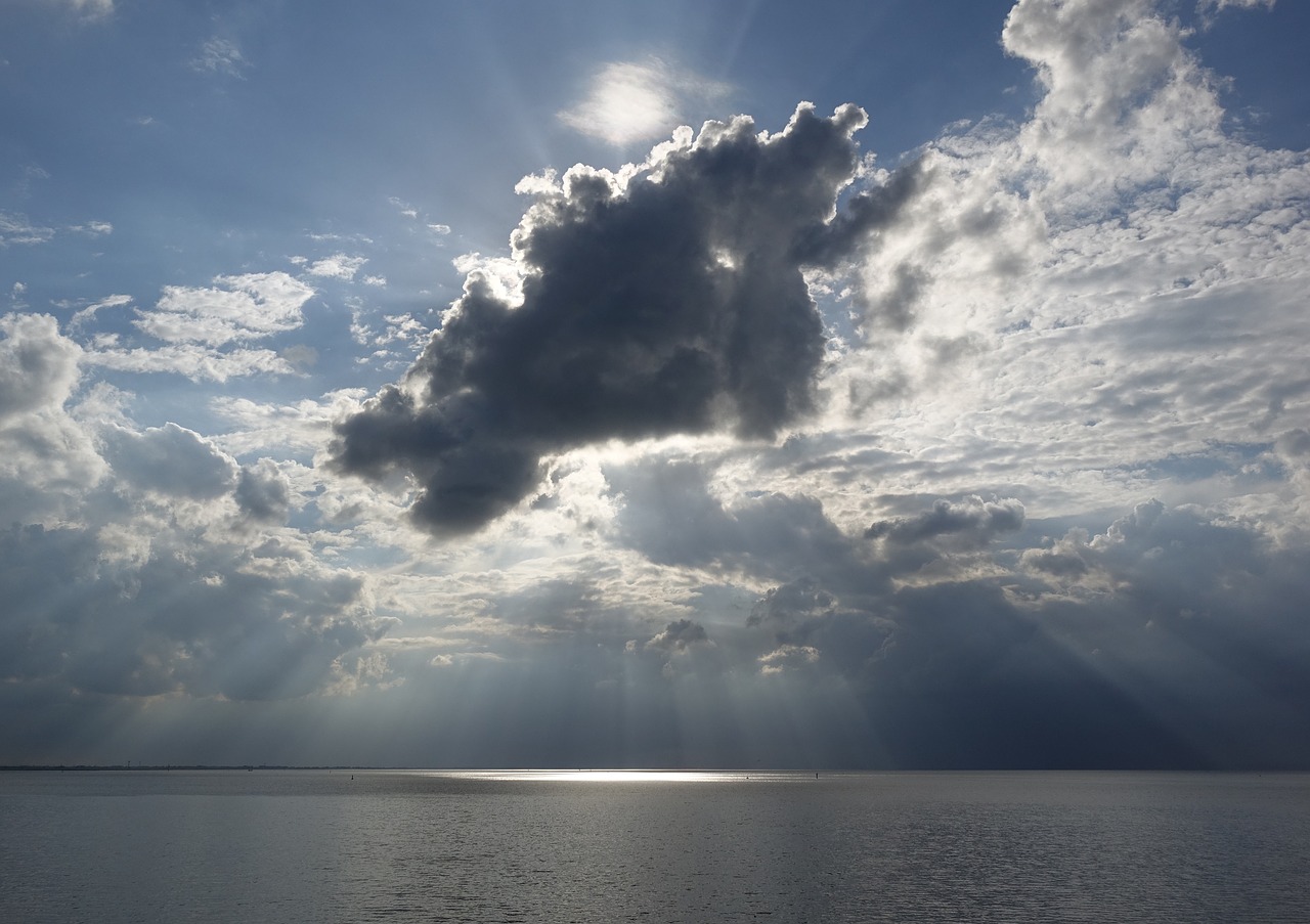 cloud formation sea sunbeam free photo