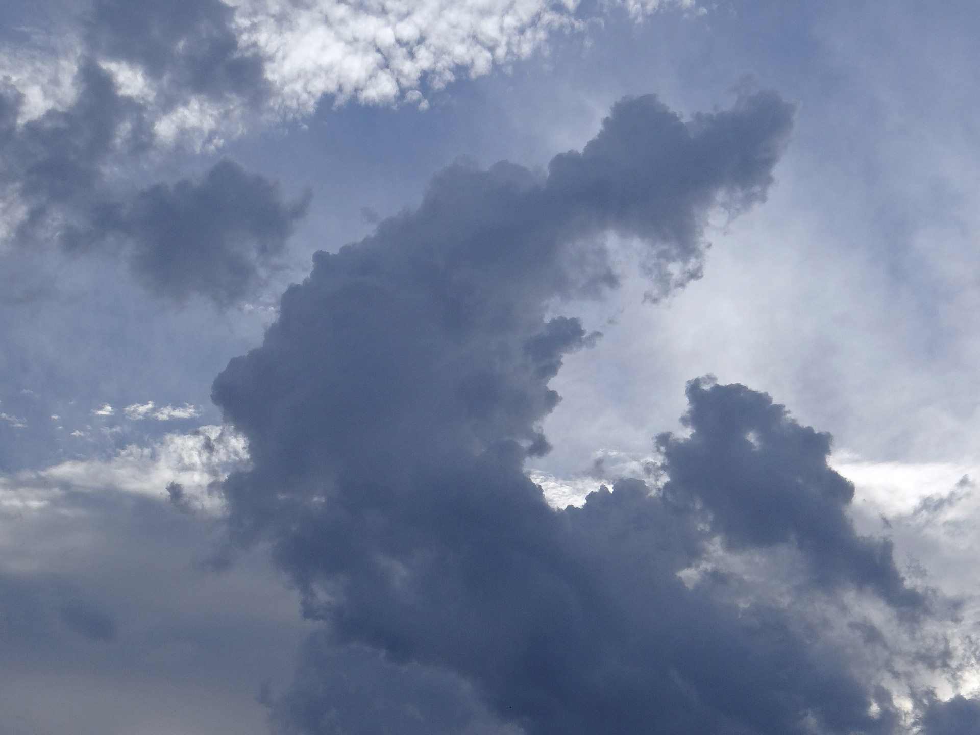 storm clouds white clouds blue sky free photo