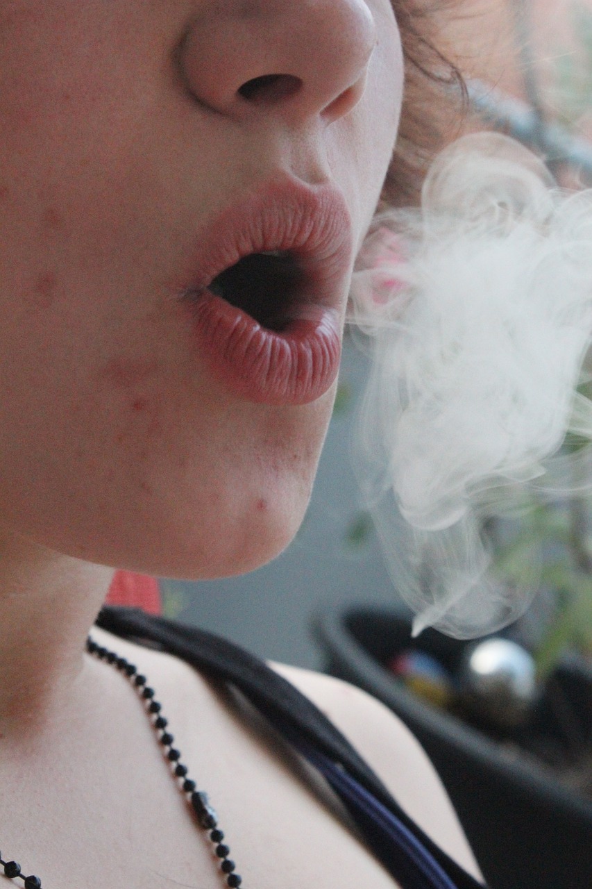 cloud of smoke smoking woman free photo