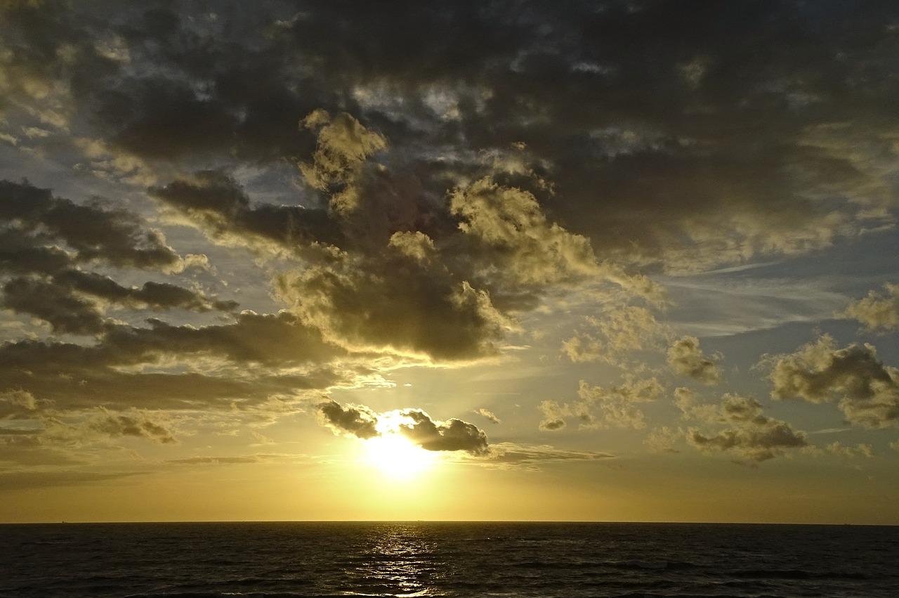 clouded sky north sea sunset free photo