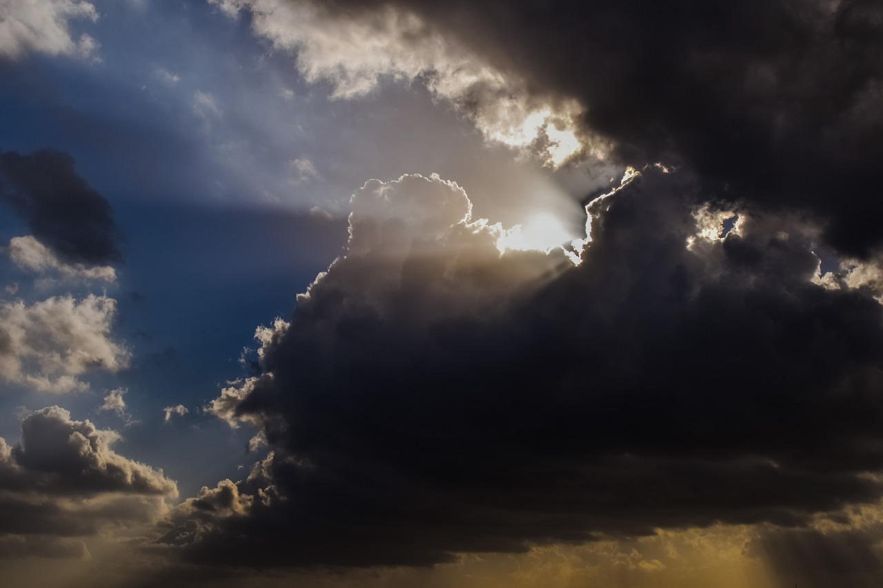 clouds black sunbeam free photo