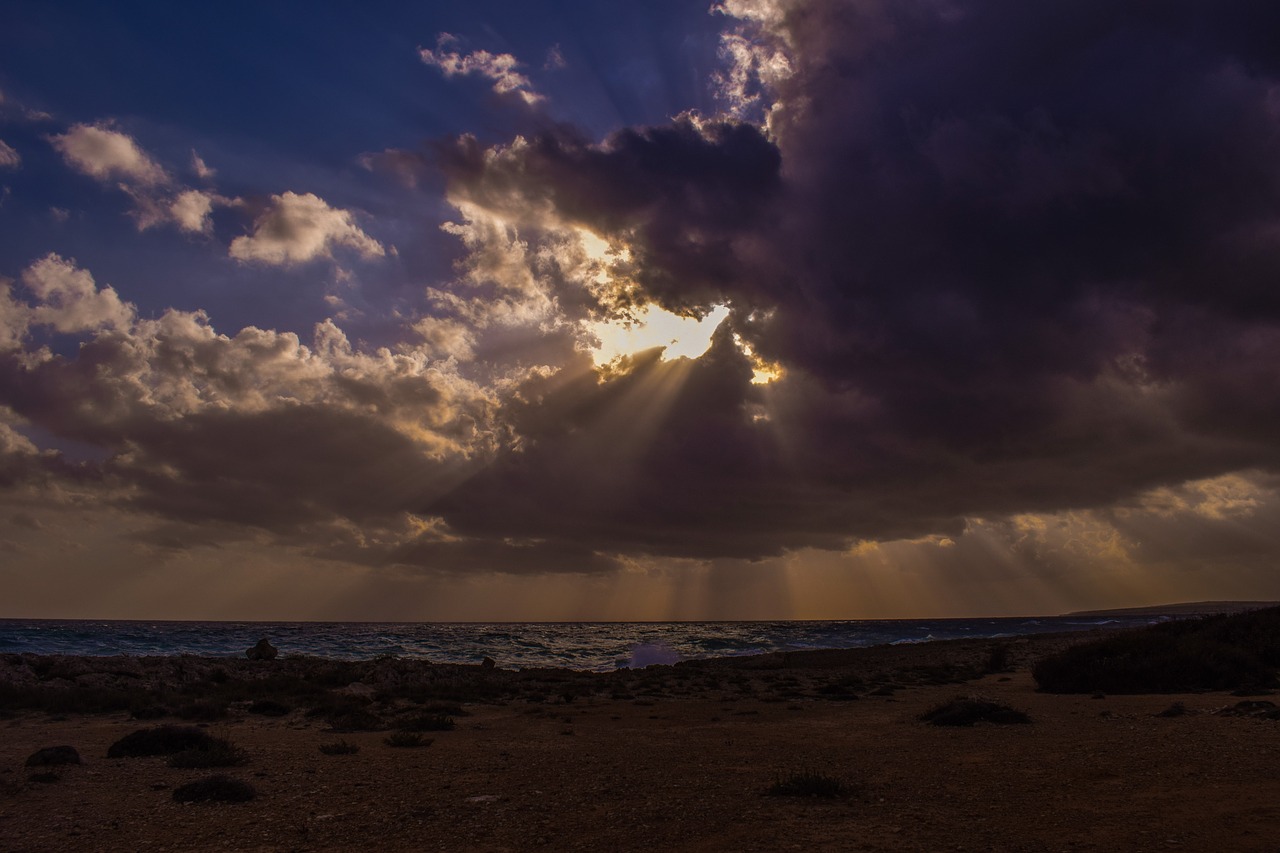 clouds black sunbeam free photo