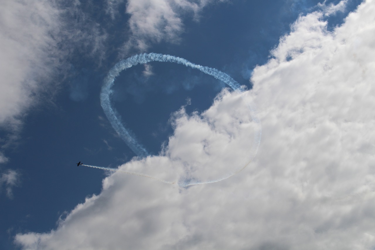clouds aircraft aerobatics free photo