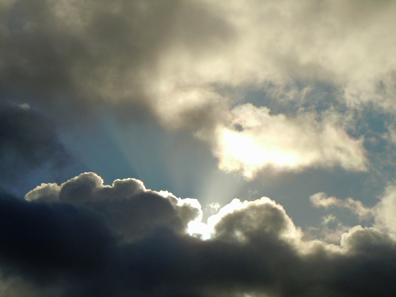 clouds sunbeam rain clouds free photo