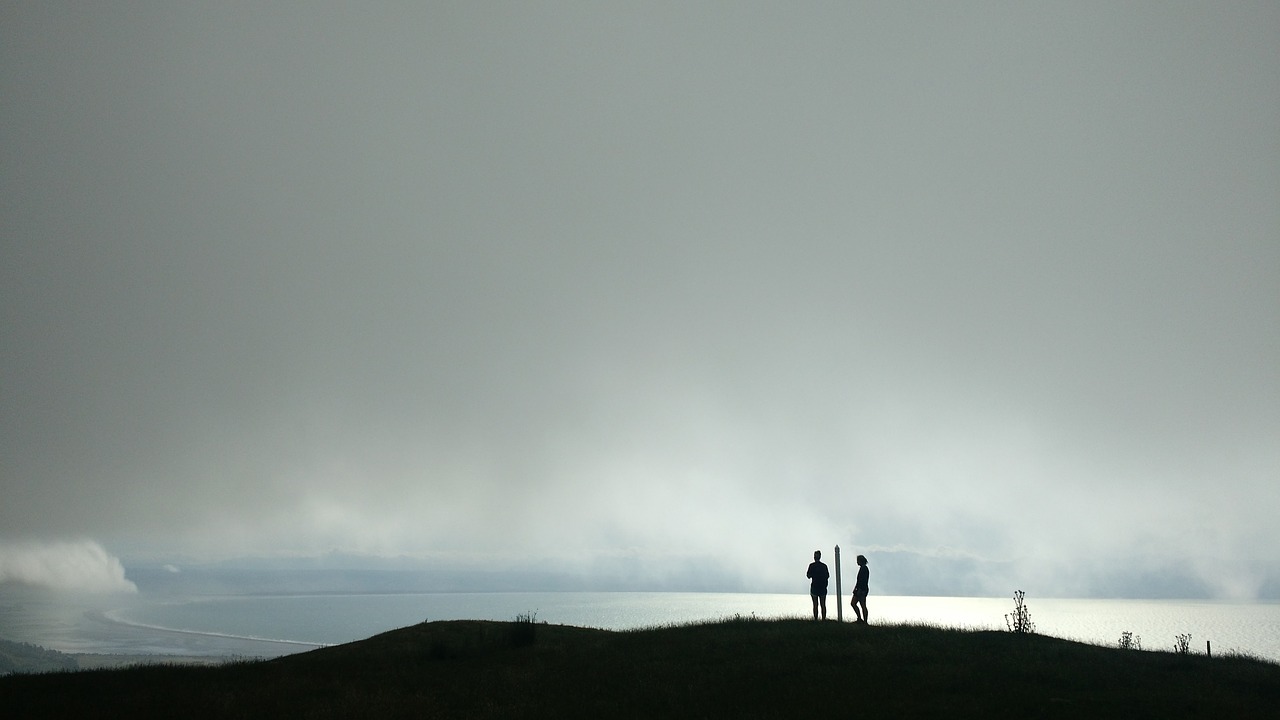 clouds hikers hills free photo