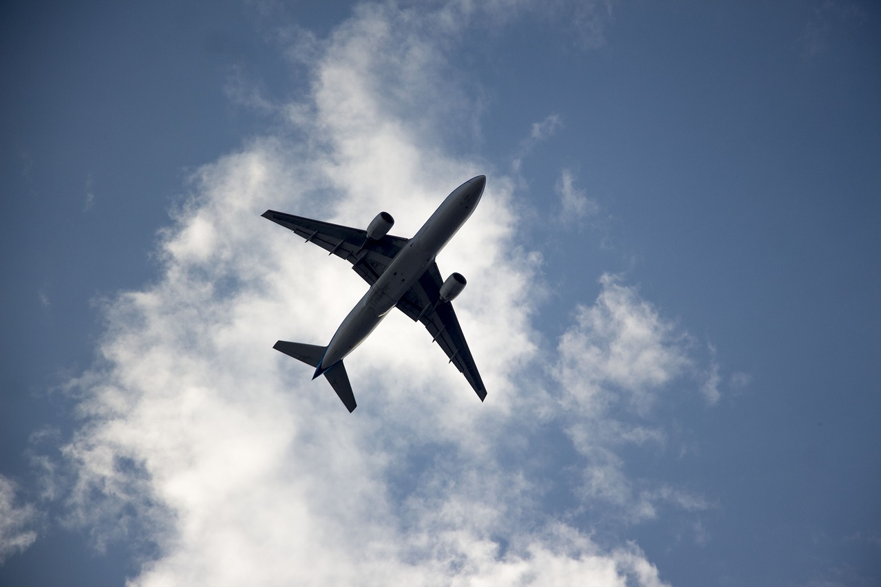 clouds sky plane free photo