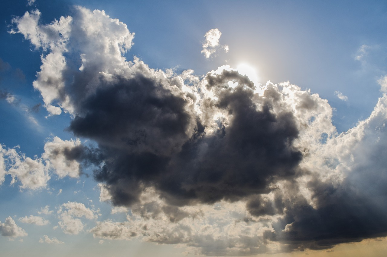 clouds sunlight sunbeam free photo