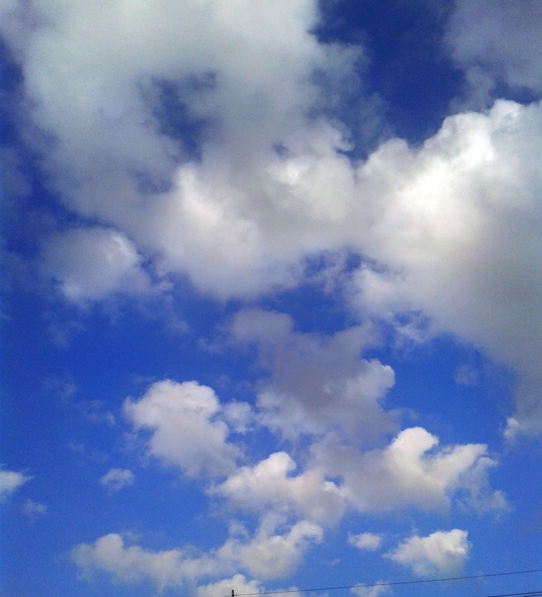 clouds cloudy sky blue sky free photo
