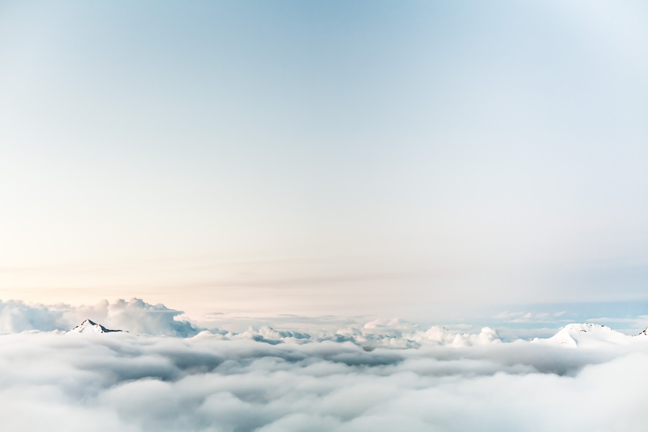 clouds above mountain free photo