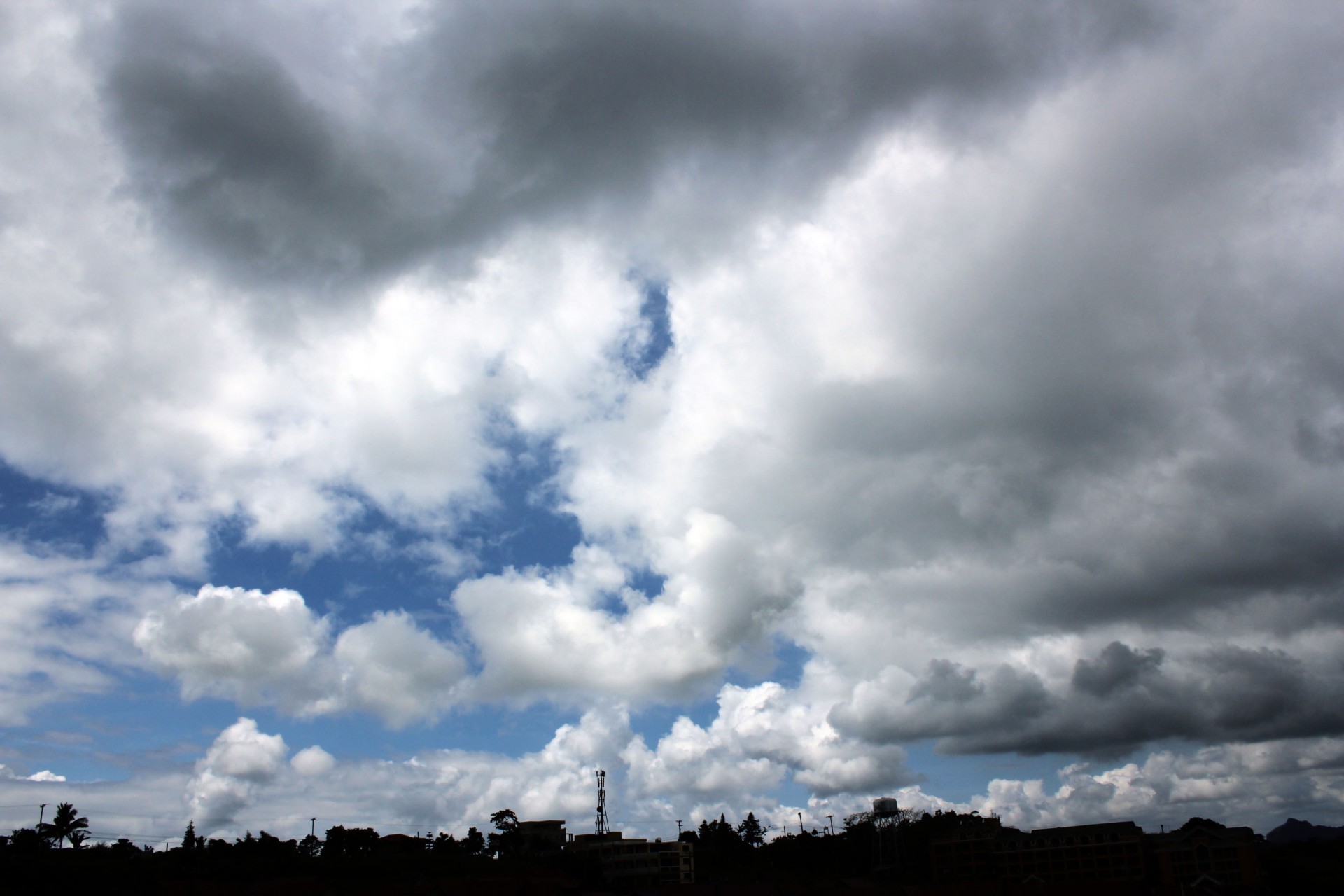 clouds cloudy sky blue sky free photo