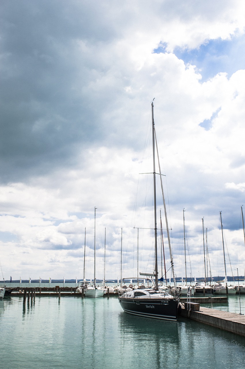 cloudy water sailboat free photo