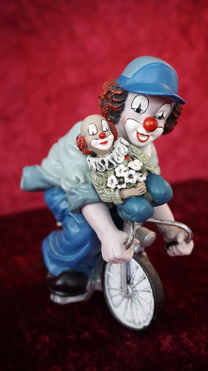 clown figures bike free photo