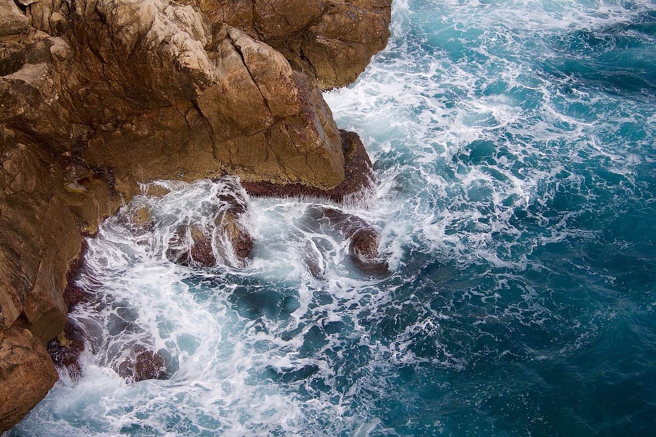 coast ocean rocks free photo