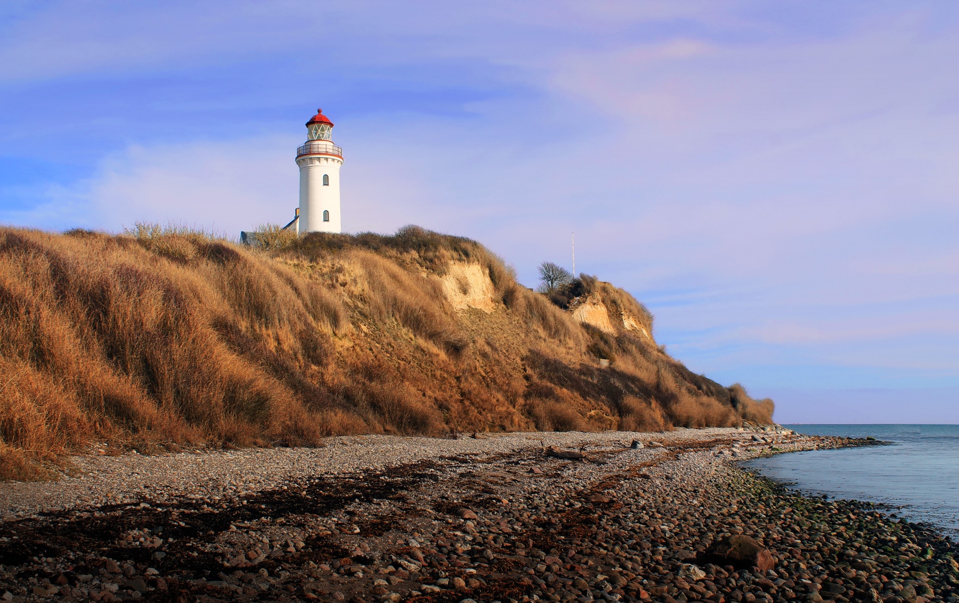 lighthouse coast beach free photo