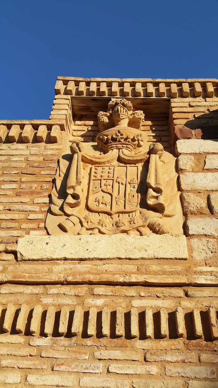 coat of arms wall stone free photo