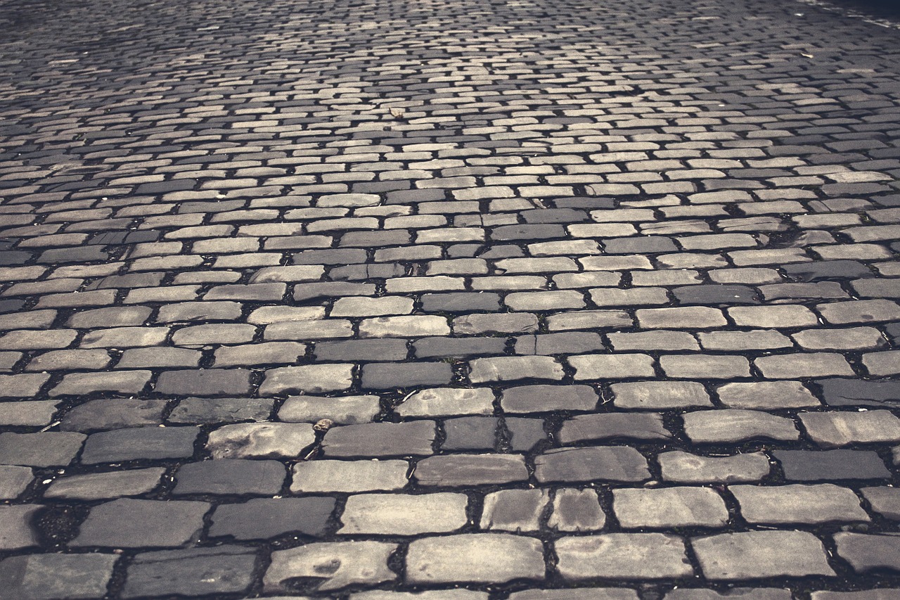 cobblestones road paving stones free photo
