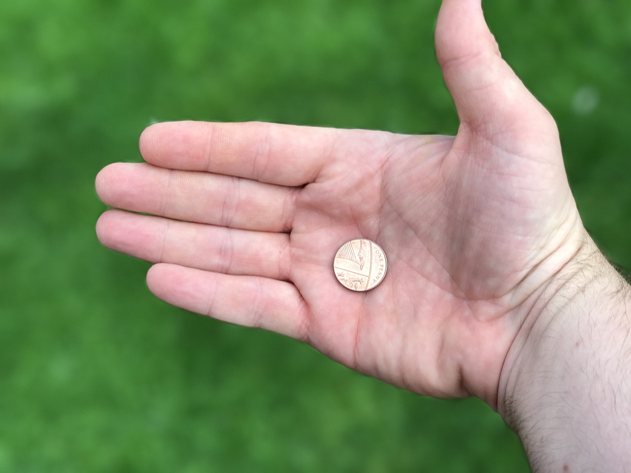 coin hand green free photo