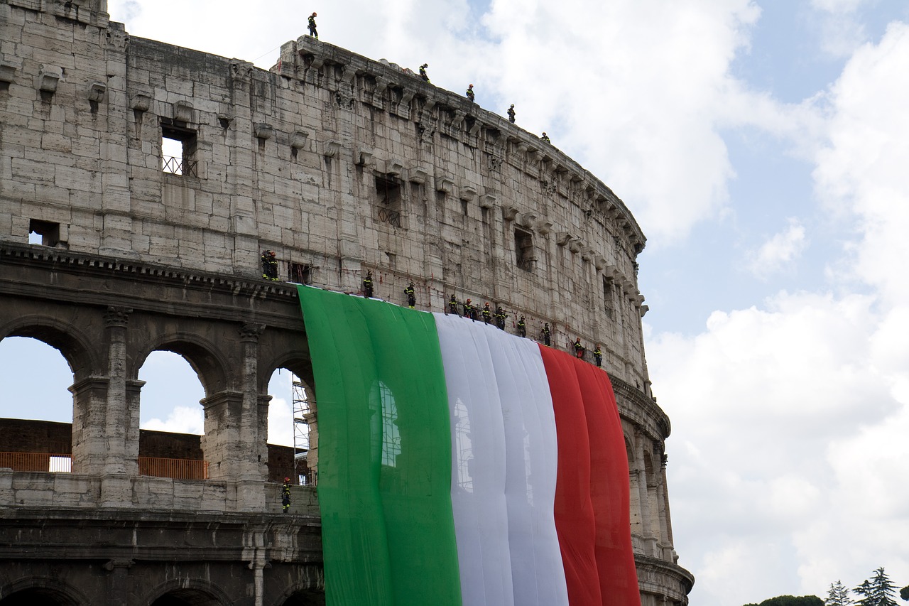 coliseum  flag  industrial climbers free photo